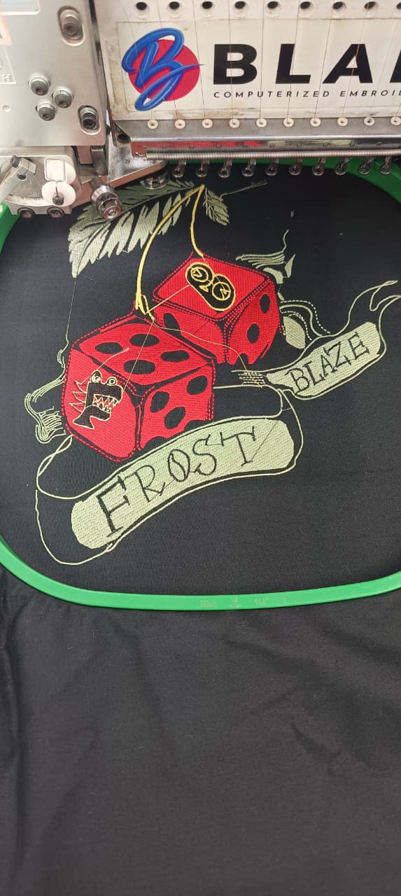 Frost Blaze dice embroidery design in the hoop on black fabric